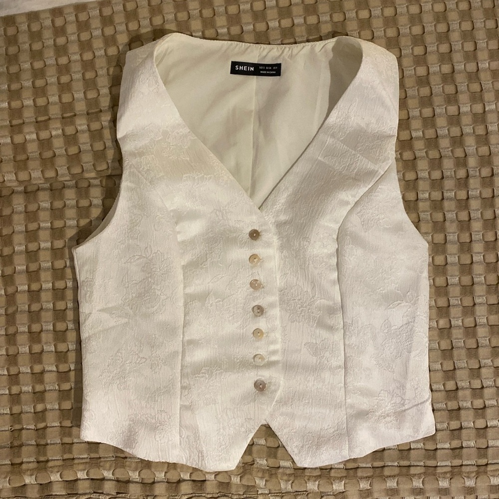 White vest top